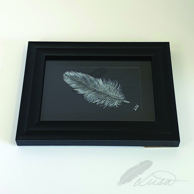 Watercolour painting of a Iridescent Silver Feather in a Black frame by Liisa Clark
