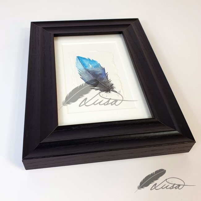 Heaven Watercolour Feather Floating in a White Boxframe by Liisa Clark