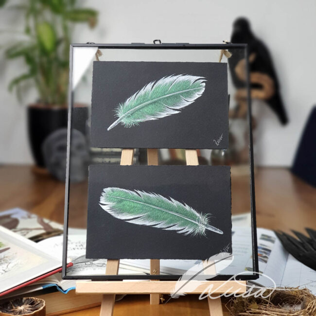 Hand Painted Twin Green Iridescent feathers set in a Clear Glass frame
