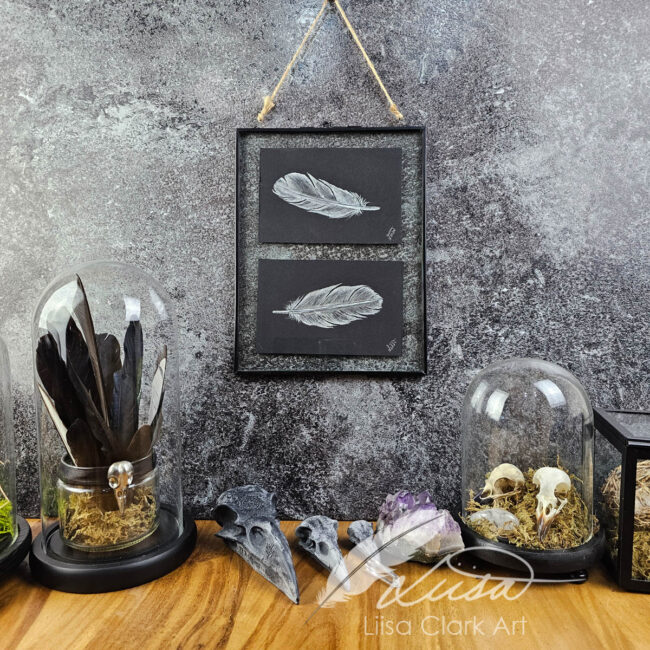 Hand Painted Twin Silver Iridescent feathers set in a Clear Glass frame