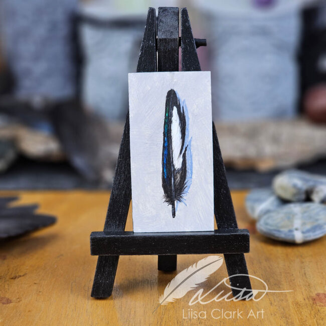 Nature Inspired Miniature Acrylic painting of a Magpie Feather by Liisa Clark Art