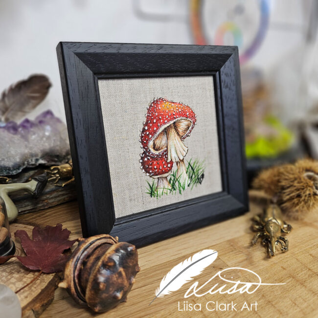 Pair of Fly Agaric Toadstools Painting on a natural Linen canvas panel set in a Contemporary Black Frame by Liisa Clark
