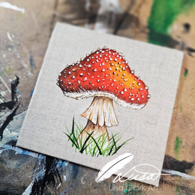 Single Fly Agaric Canvas Painting on a natural Linen canvas panel set in a Black Contemporary Black Frame by Liisa Clark
