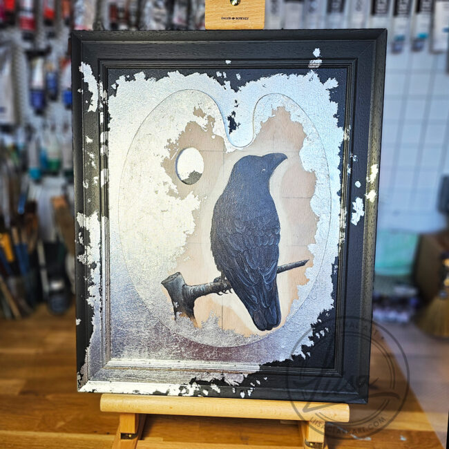 Original Painting of a Crow on an Artist palette set with Silver Leaf in a Black Frame by Liisa Clark