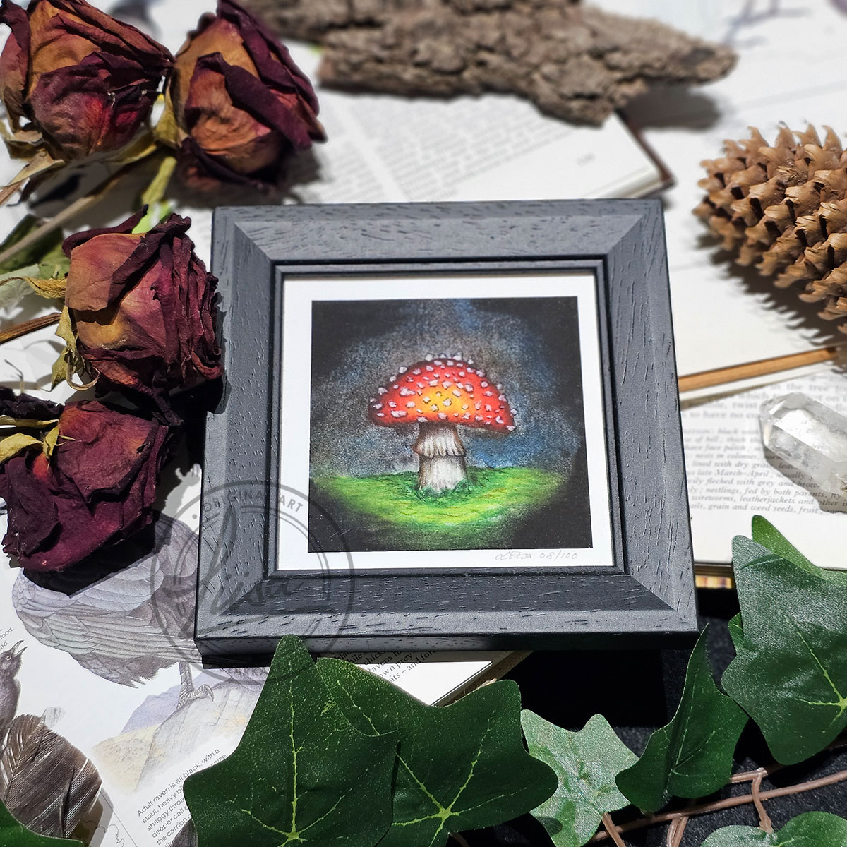 10x10cm Giclee Print Bright Toadstool in the dark in a Black Frame By Liisa Clark