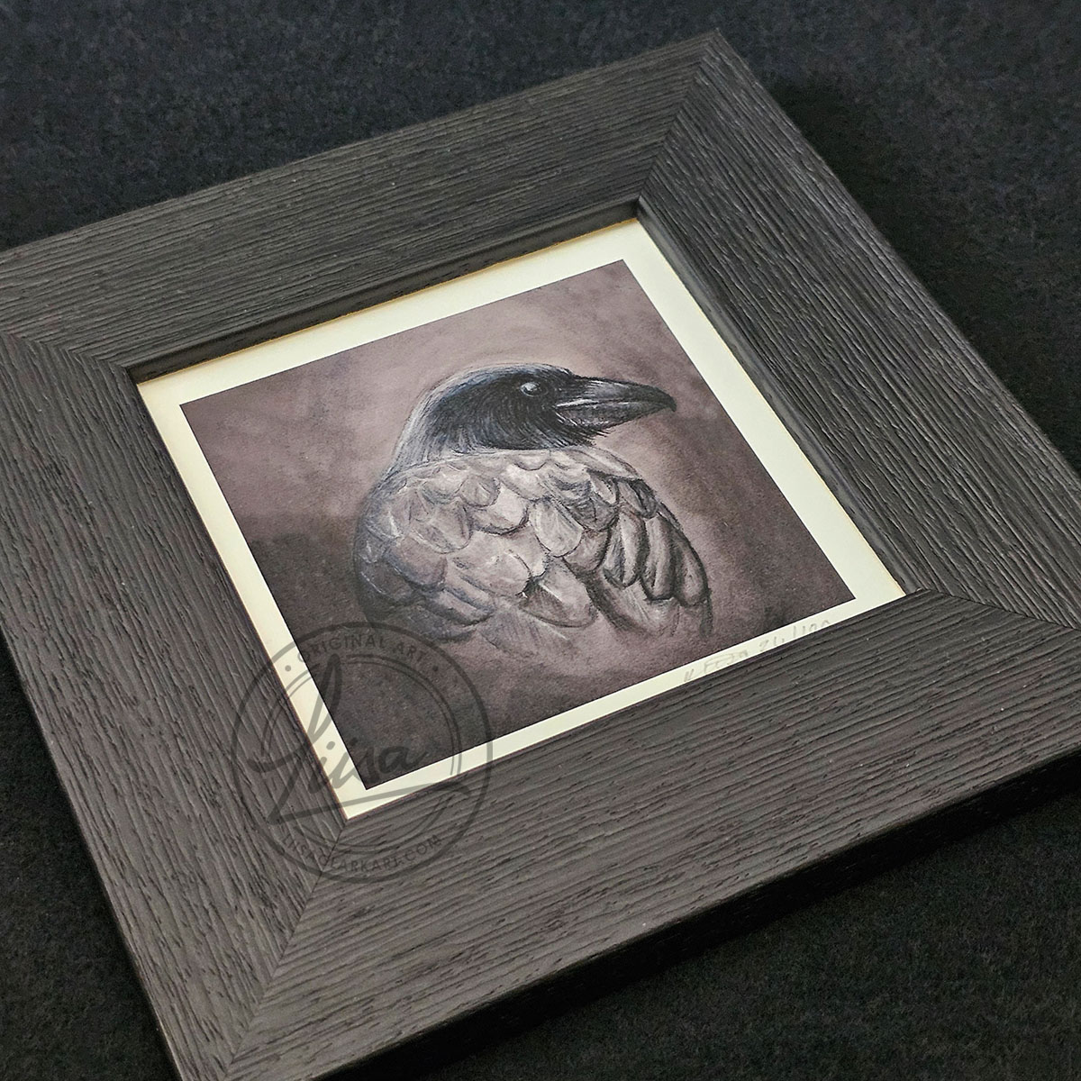 Portrait Of a Raven in Muted Grey Tones in Pastels by Liisa Clark Fine Art Print Set in a Contemporary Black Frame by Liisa Clark