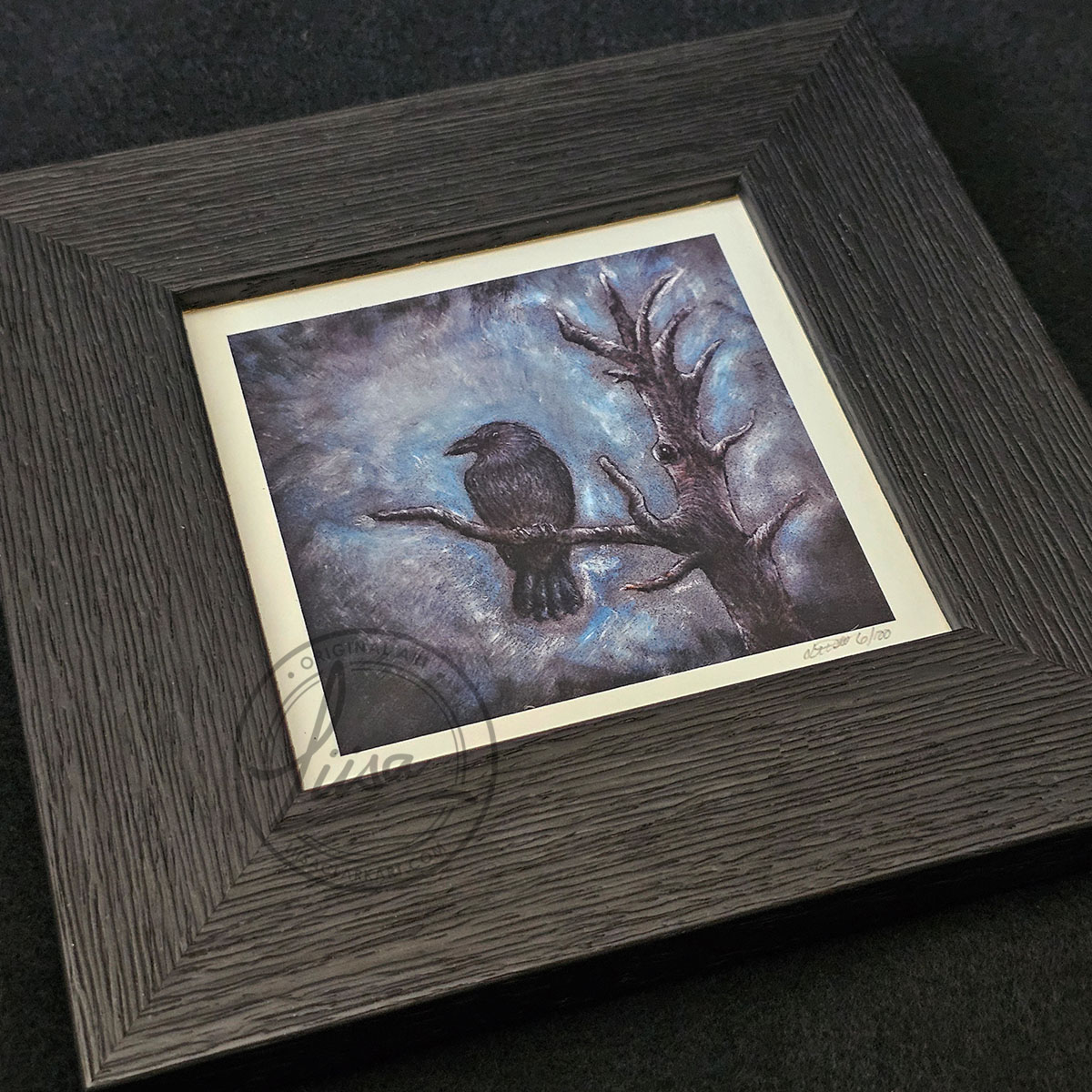 Crow Portrait titled King of the Woods in Muted Blue Tones in Pastels by Liisa Clark Fine Art Print Set in a Contemporary Black Frame