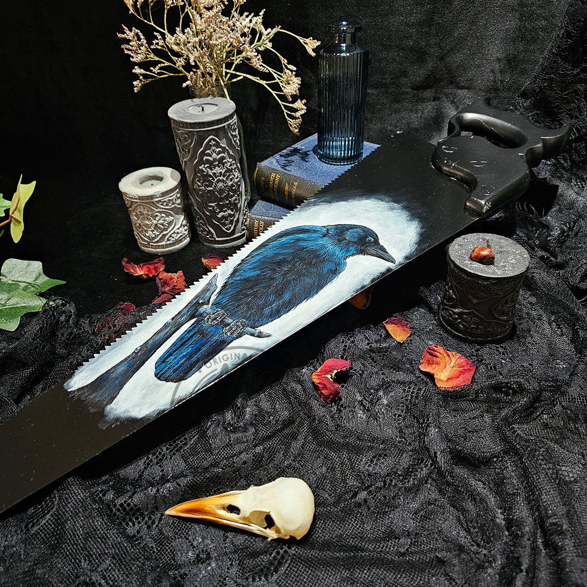 Close detail of the the Crows eye and feathers painted in layer Acrylic paints