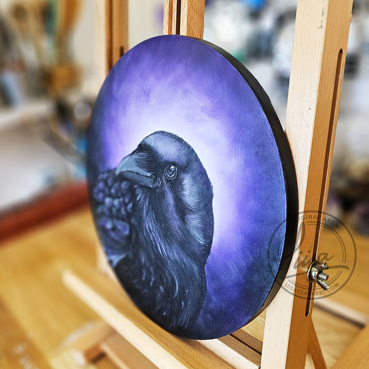 Original Oil Painting on an Artist Easel of a Crow with Violet hues part of the Corvid Chroma Series By Liisa Clark
