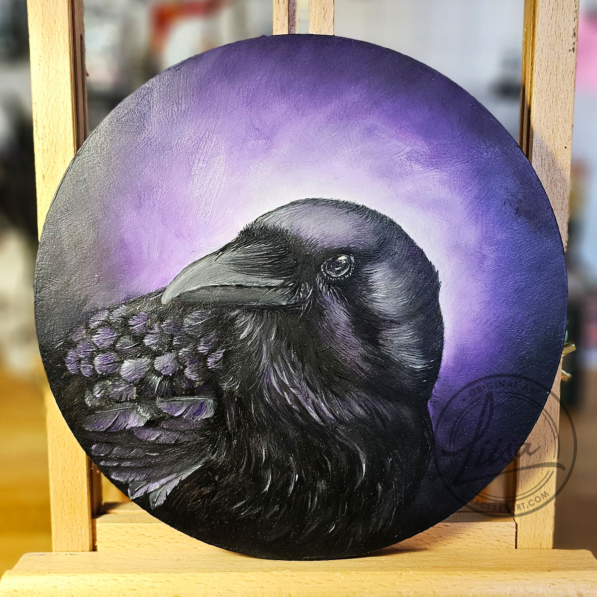 Original Oil Painting on an Artist Easel of a Crow with Violet hues part of the Corvid Chroma Series By Liisa Clark