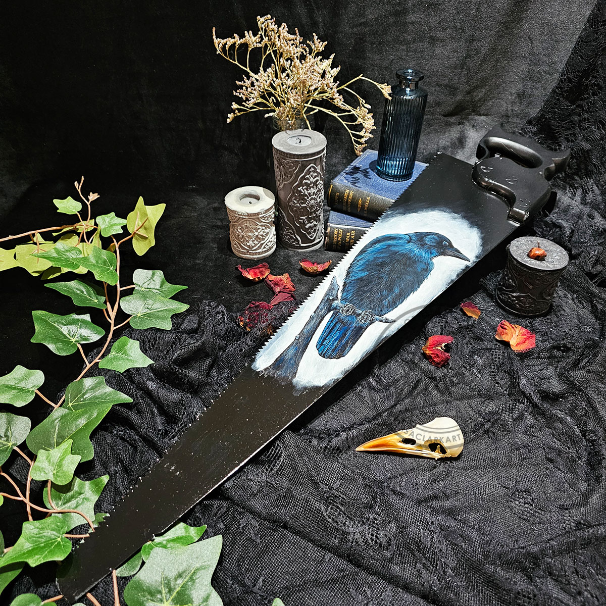 Side Angle showing texture of the Acrylic paint and the Blade on an antique saw with crow art inspired by Irish mythology and the Morrigan
