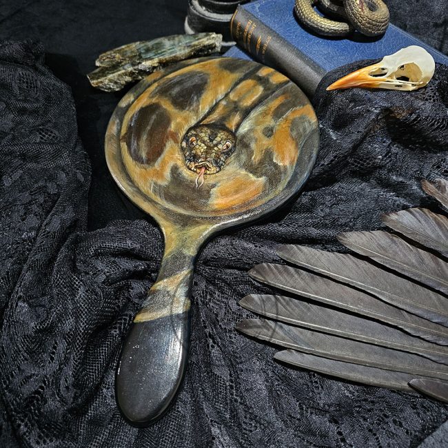 python snake painting on antique mirror by wildlife artist Liisa Clark
