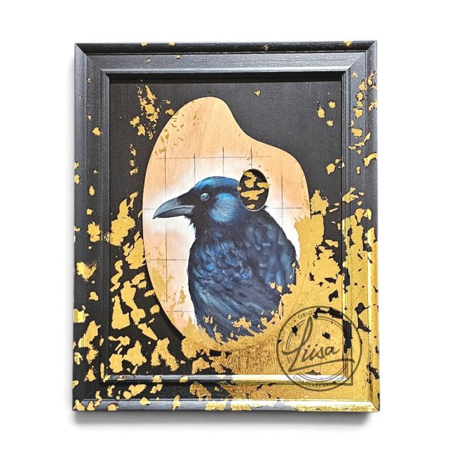 Original raven artwork painted on a reclaimed artist's palette with hand-applied gold leaf, mounted and framed in black wood as part of the All That Glitters series by Liisa Clark