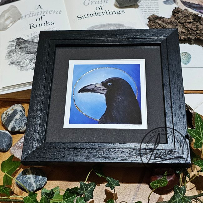 Contemporary framed rook giclée print with gold leaf detailing and blue background by Liisa Clark Art.