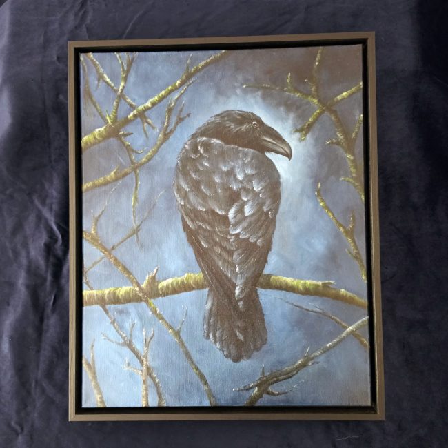 The Watchful Guardian original crow oil painting by Liisa Clark, framed against a black background